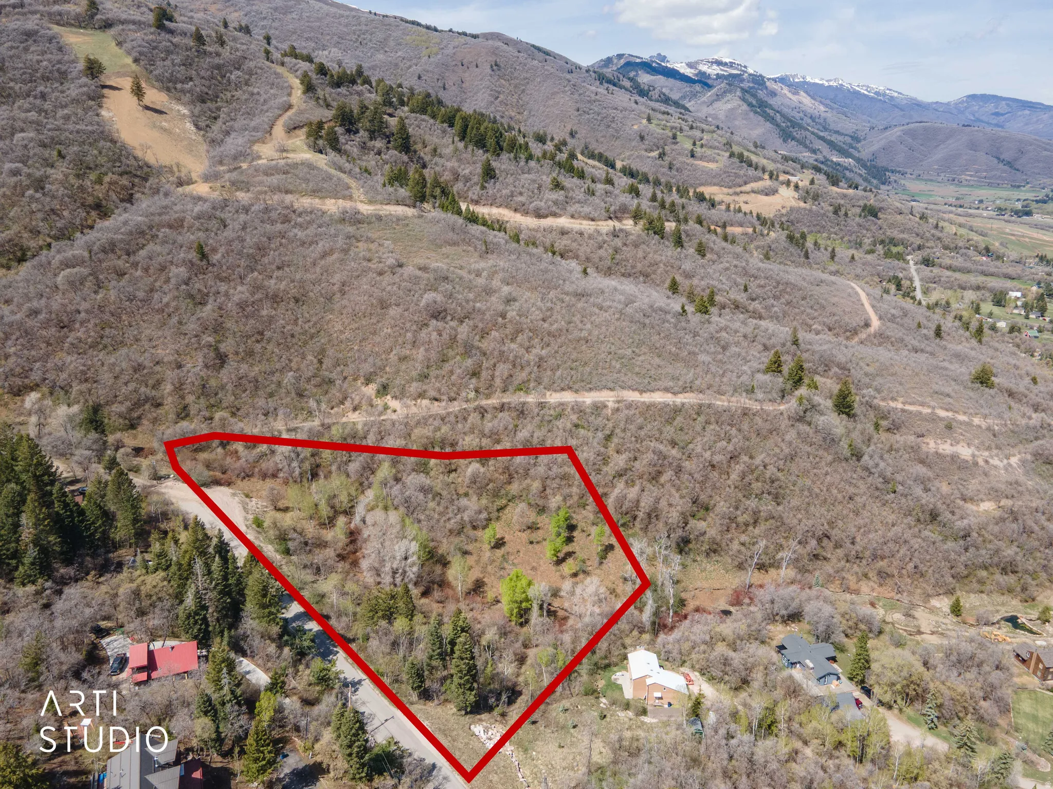 View of rural area featuring property parcel outlined and a mountain backdrop