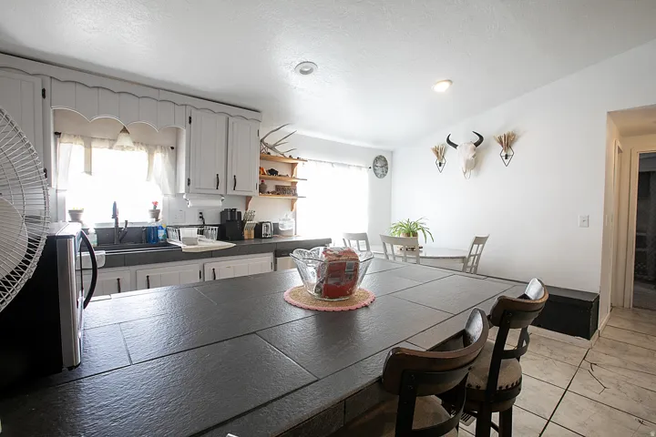 Dining area featuring a textured ceiling