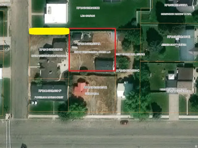 Aerial map of property and surrounding area featuring property parcel outlined