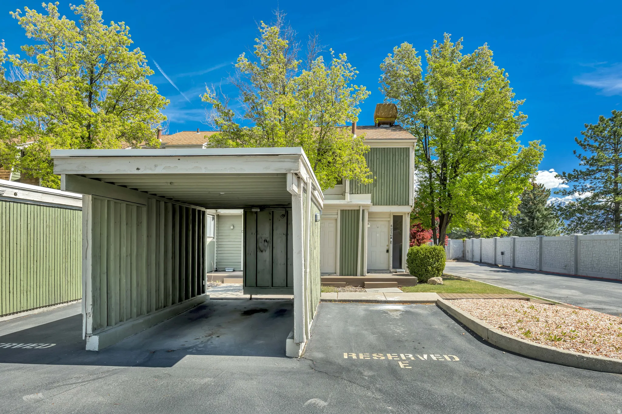 View of front of property featuring covered parking
