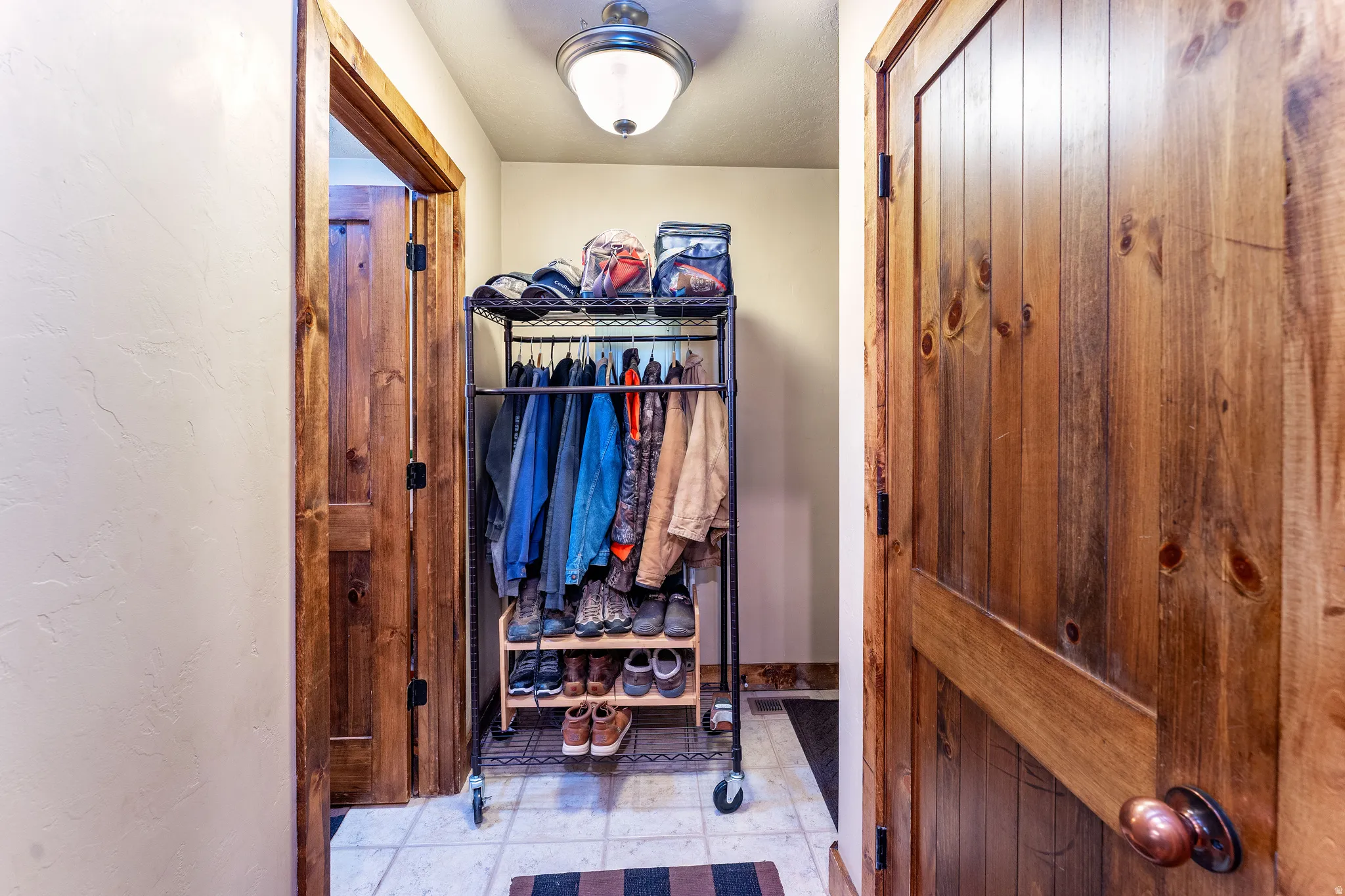 Entry from kitchen to 1/2 bath with laundry room or door to outside.