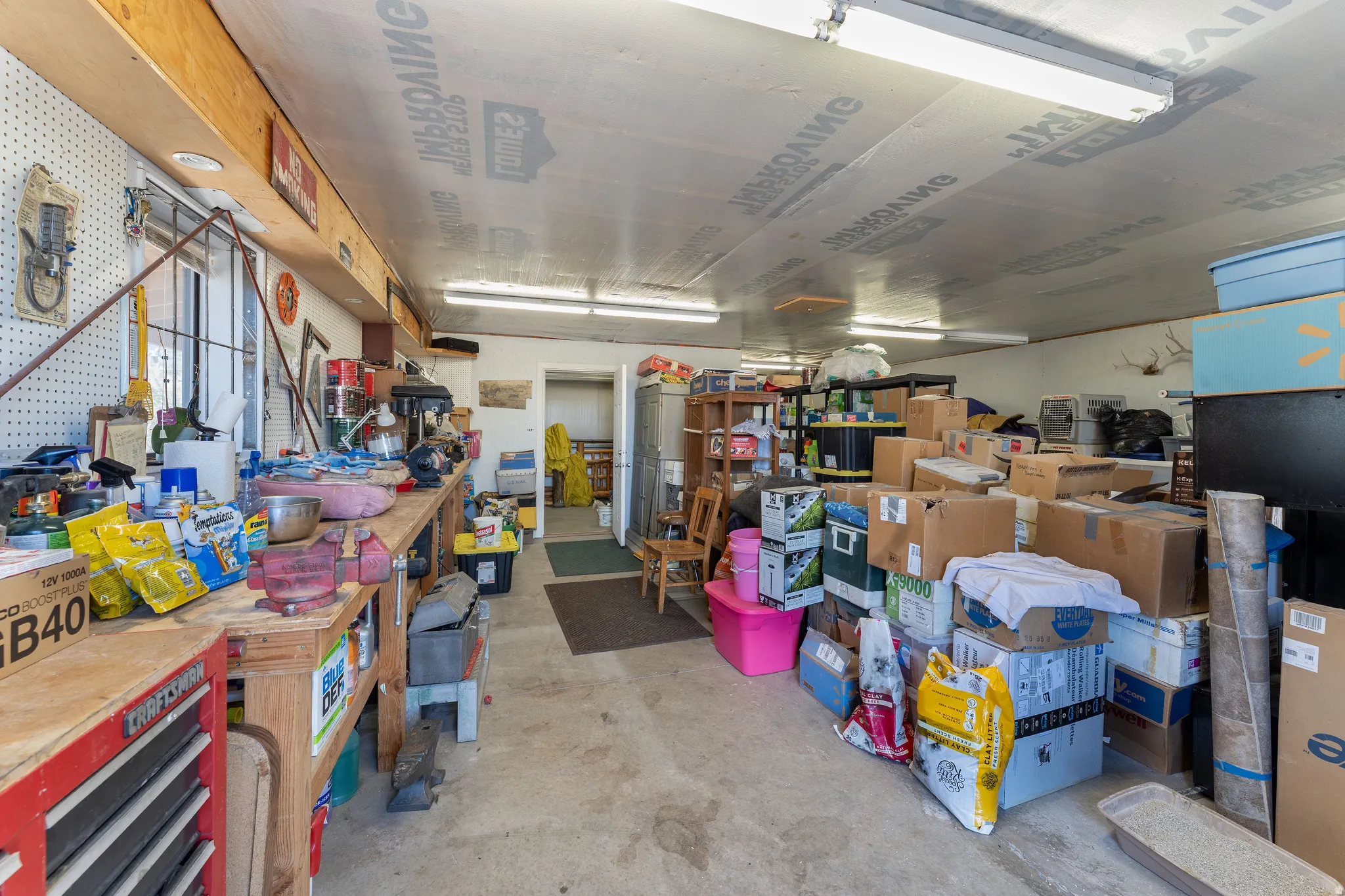 Shop featuring a workshop area, so much room for storage!