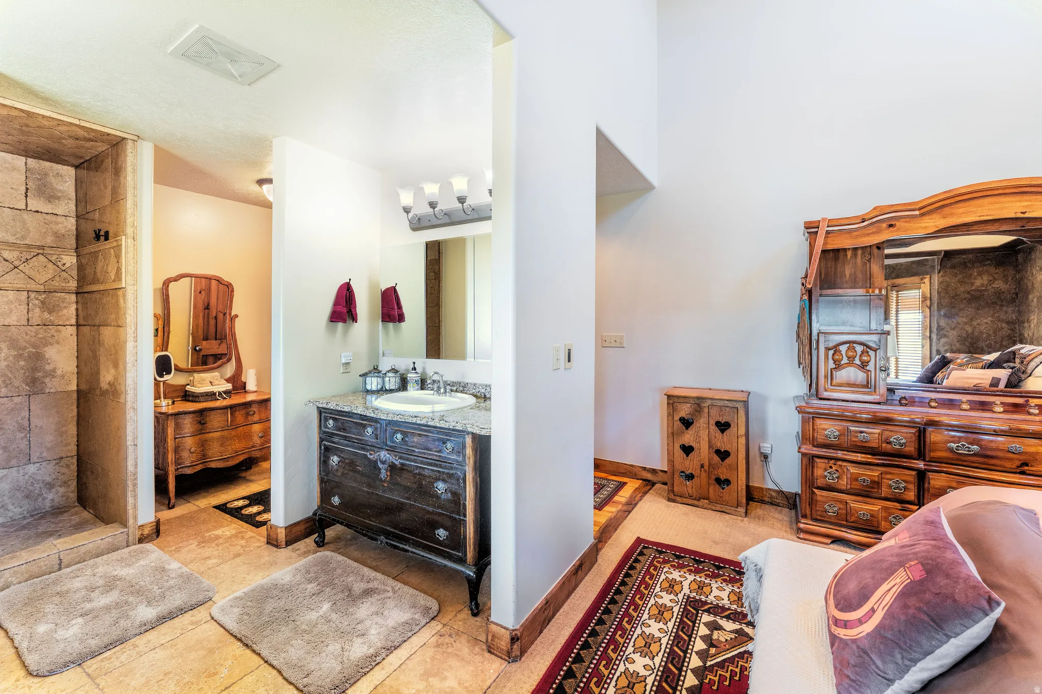 Master Bathroom featuring vanity, and tiled shower