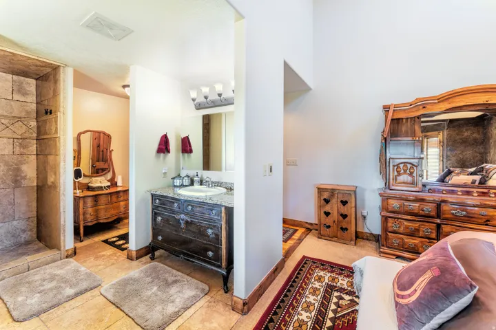 Master Bathroom featuring vanity, and tiled shower