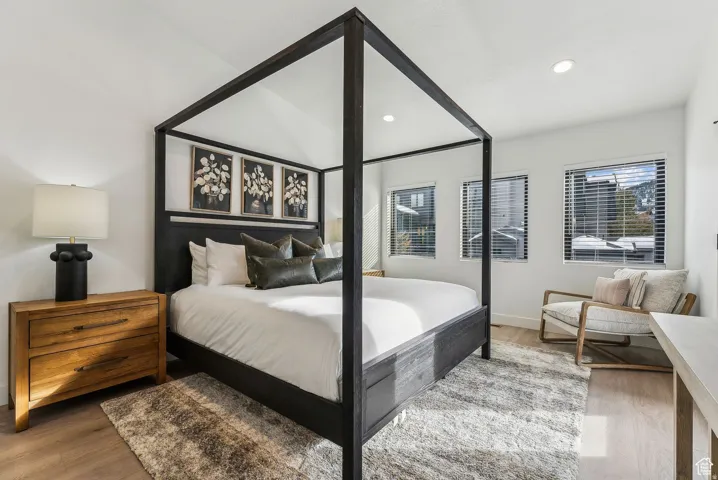 Bedroom featuring light wood-type flooring and recessed lighting
