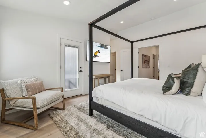 Bedroom featuring light wood-style floors and recessed lighting