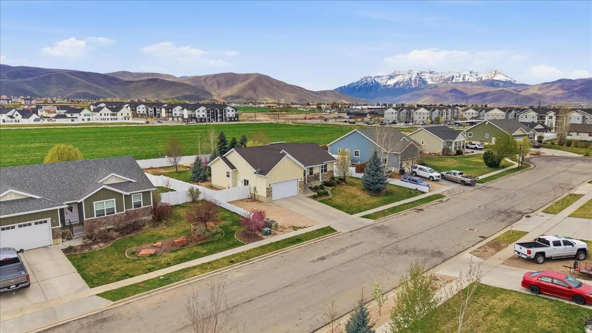Aerial view of residential area featuring a mountain views