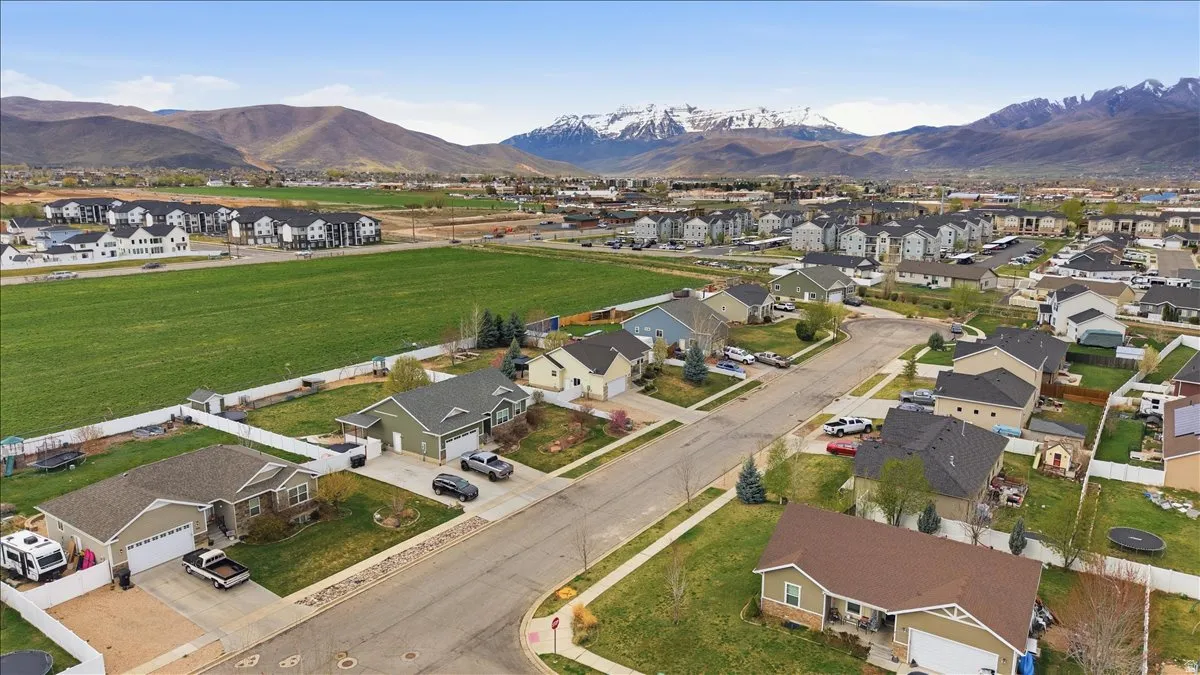 Aerial perspective of suburban area featuring mountain views