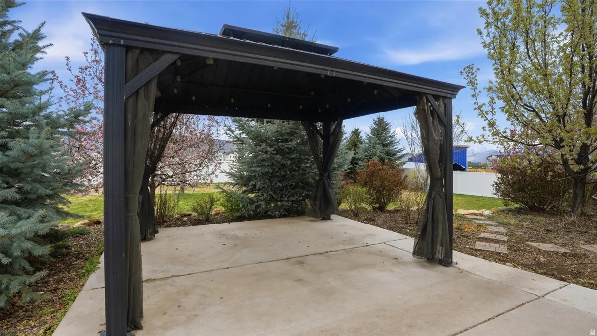 View of patio featuring a gazebo