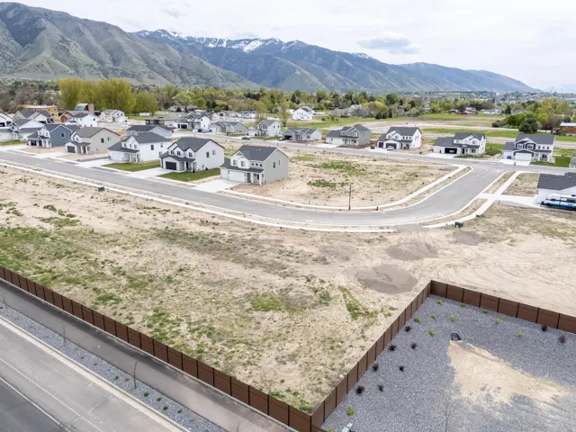 Aerial view of residential area with a mountainous background
