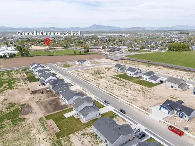 View of property location with nearby suburban area and a mountain backdrop