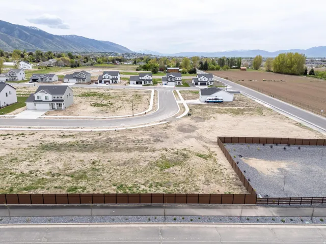 Aerial view of residential area featuring mountains