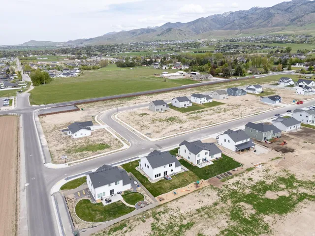 View of property location with nearby suburban area
