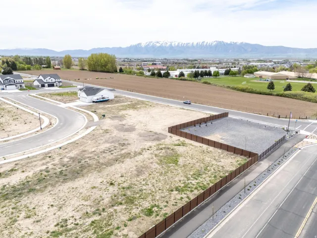 Aerial perspective of suburban area with a mountain backdrop