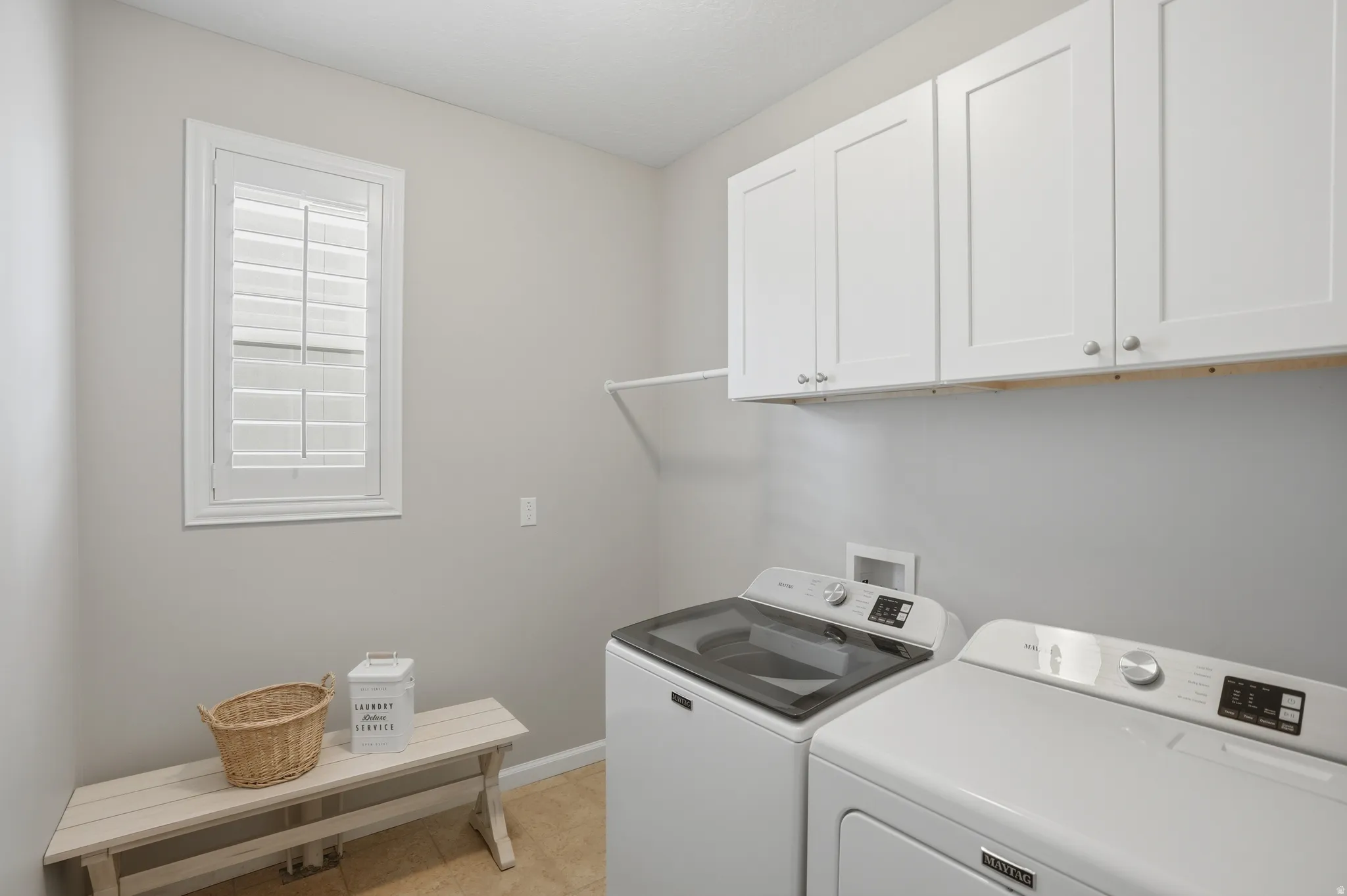 With cabinets for storage & supplies
