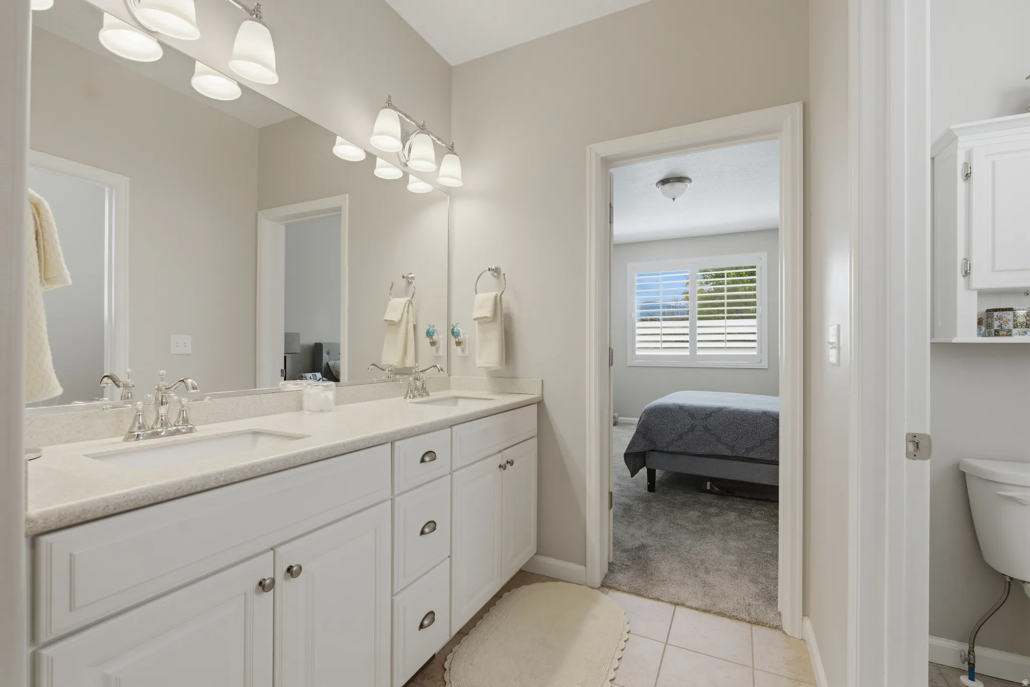 Primary bathroom and spacious walk in closet