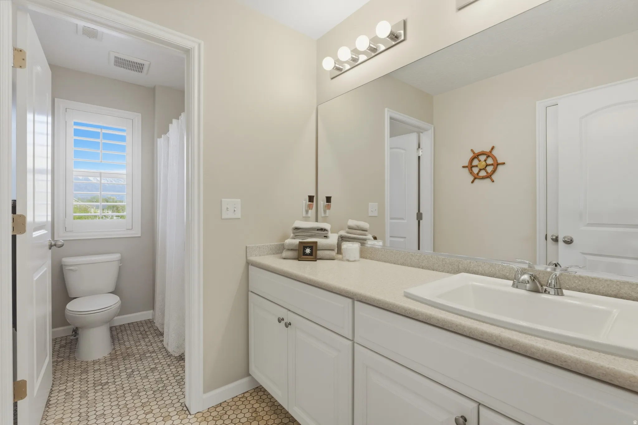 Second full bathroom upstairs. Toilet and tub in separate (attached) room
