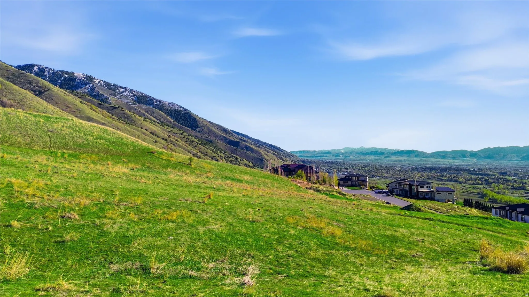 Ground view of property with mountain background