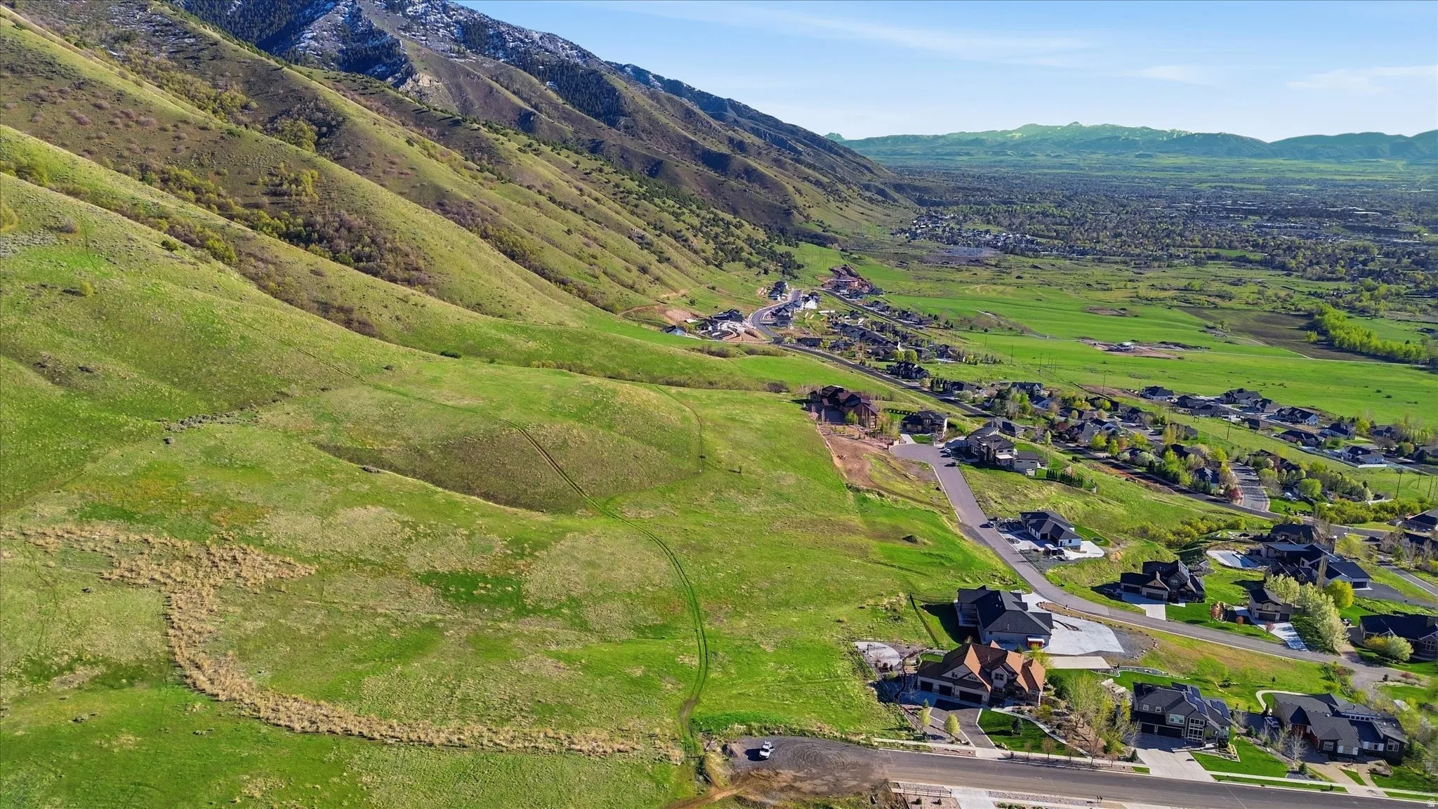 Bird's eye view of the property and Southward view of the valley.