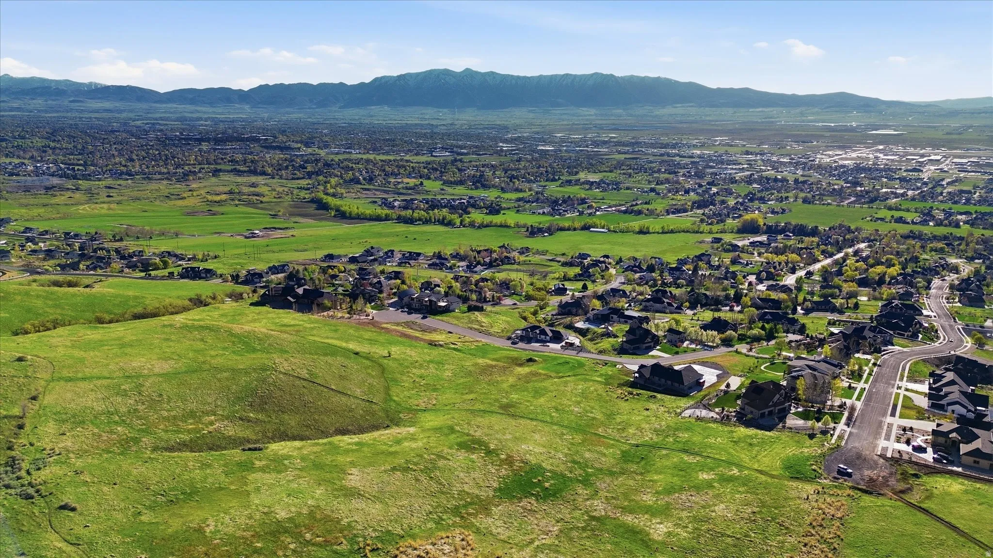 Aerial Southwestern view of the valley with Wellsville mountains as background