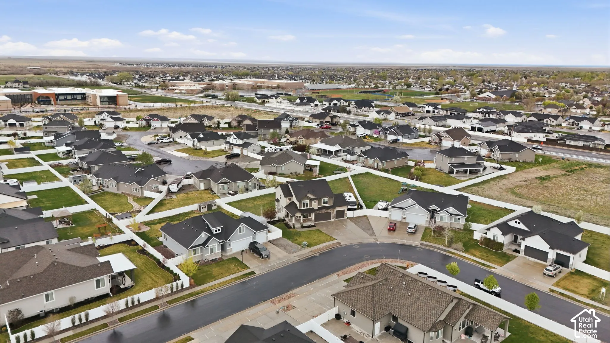View of property location with nearby suburban area