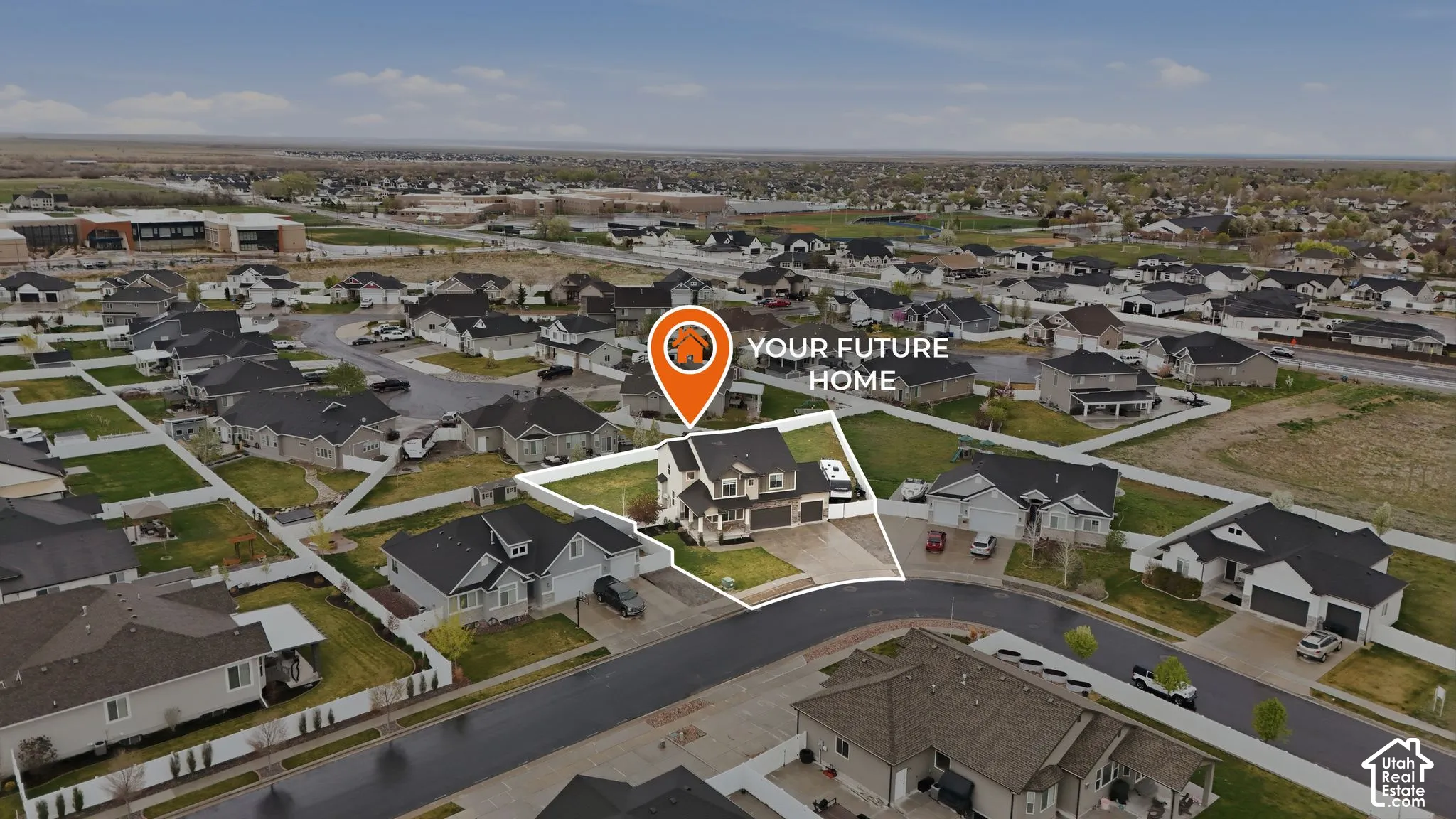 Aerial view of property's location with nearby suburban area