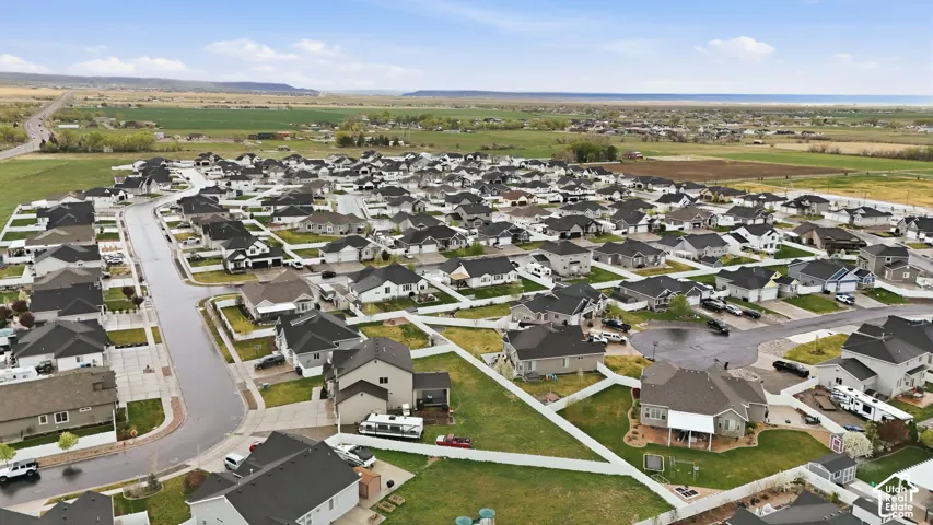 Aerial overview of property's location featuring nearby suburban area