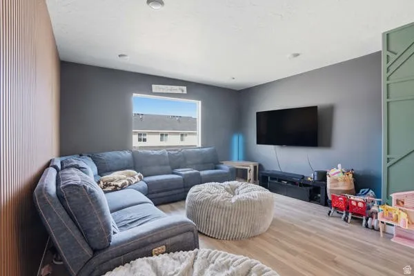 Living area featuring wood finished floors
