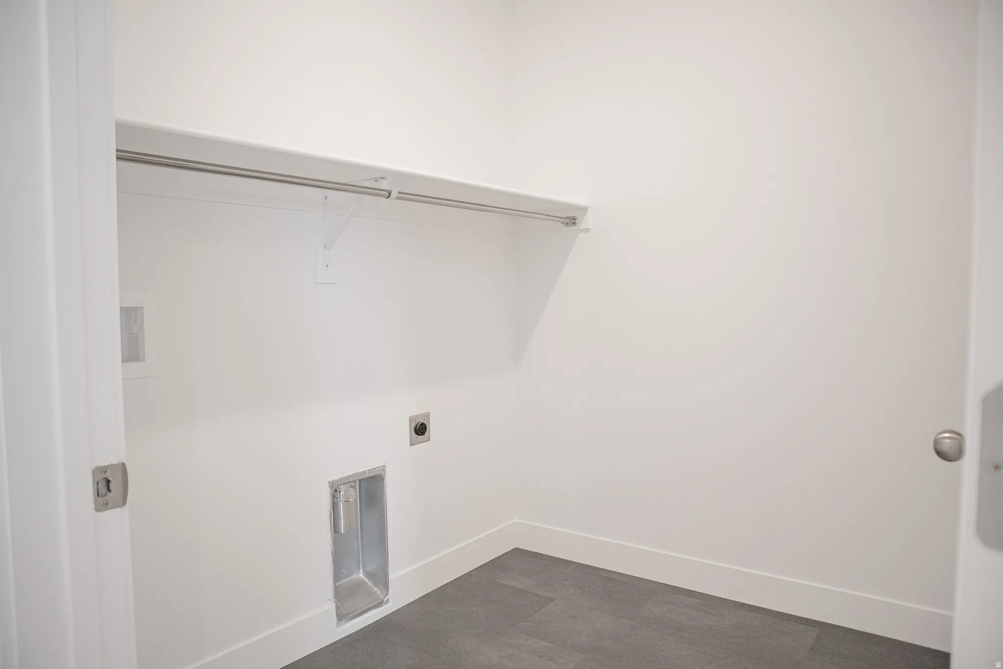 Full-size laundry room with washer/dryer hookups.