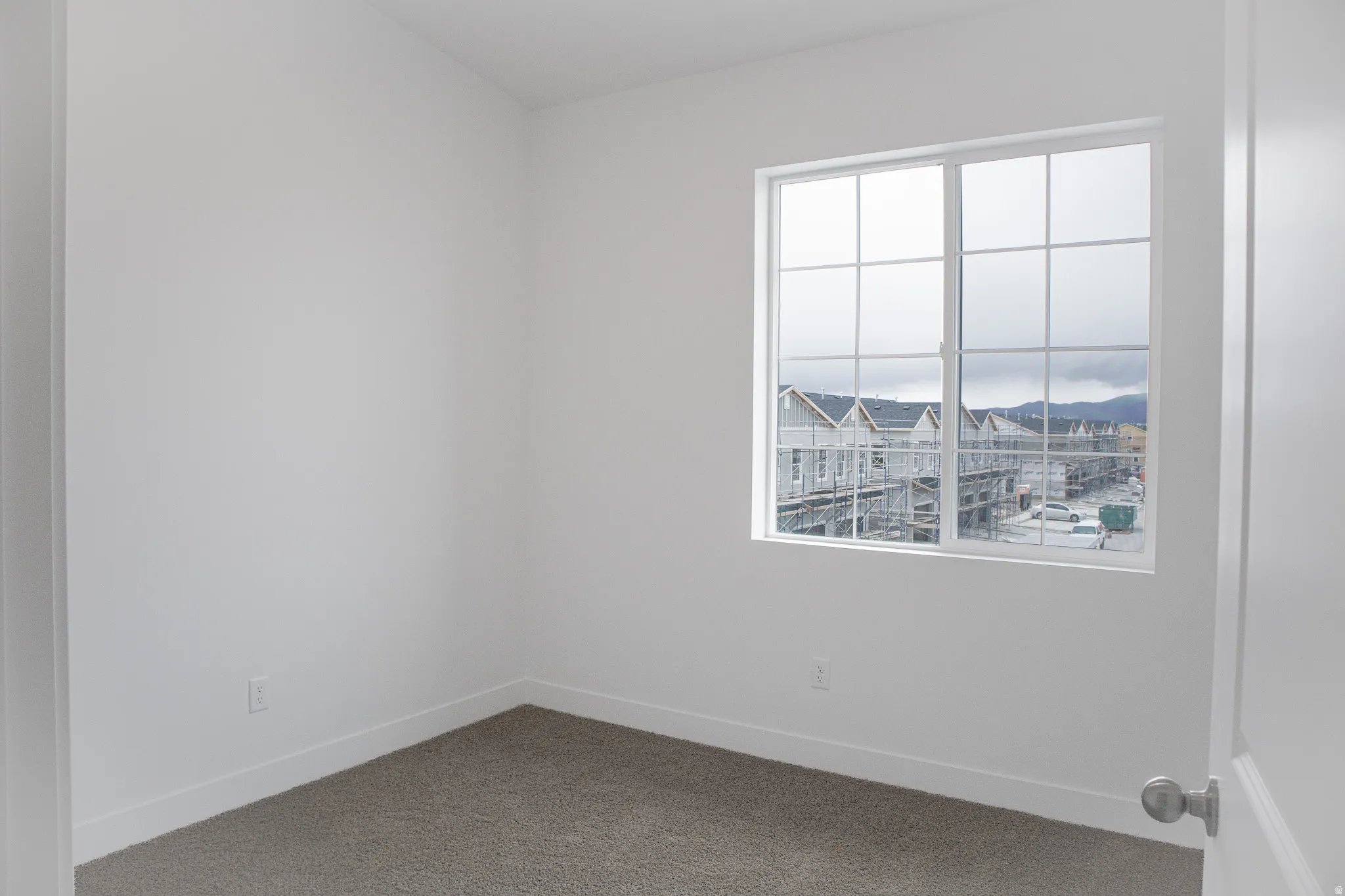 Bedroom #2 with large closet and vaulted ceiling.