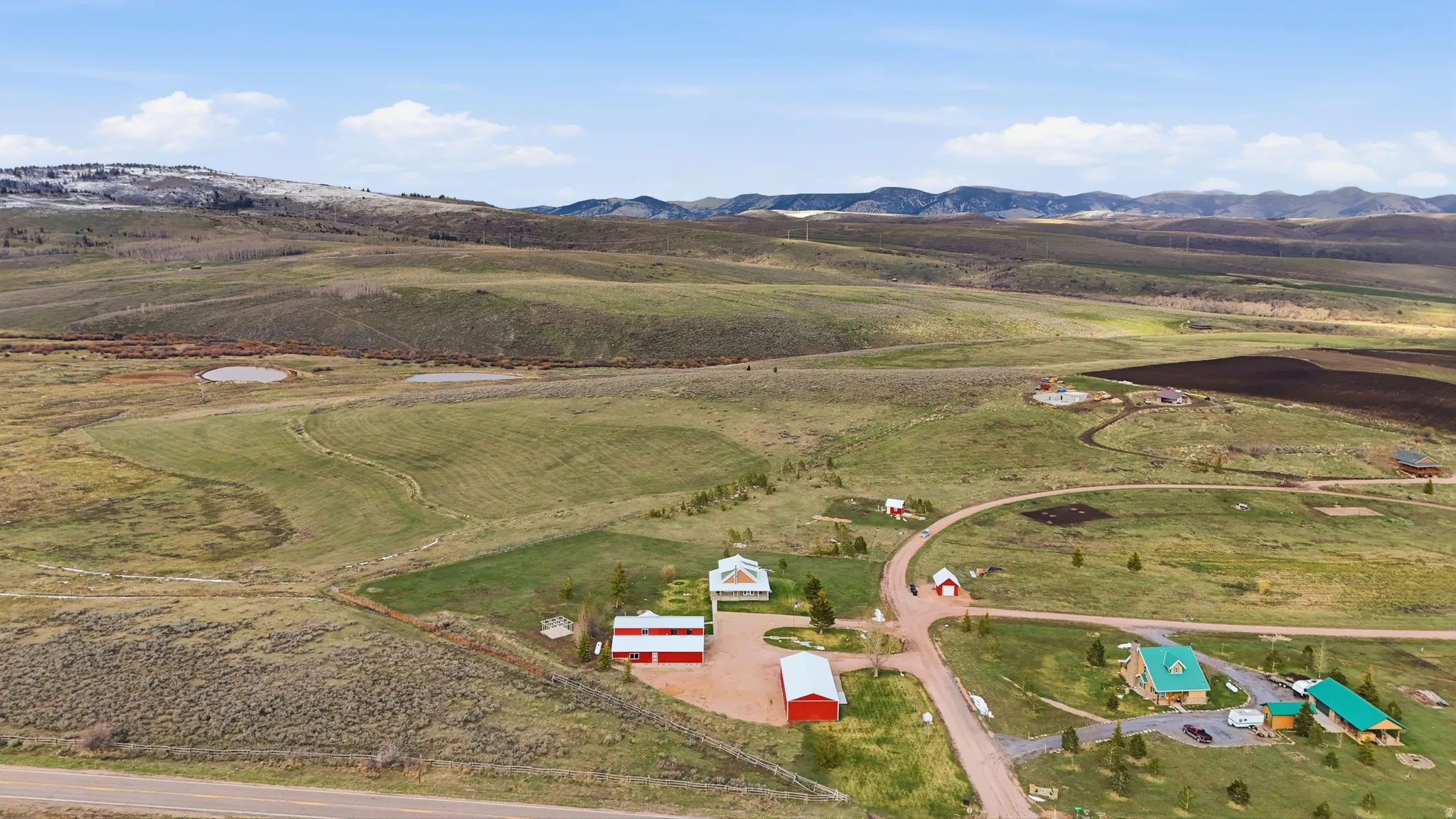 Aerial view of sparsely populated area with mountains