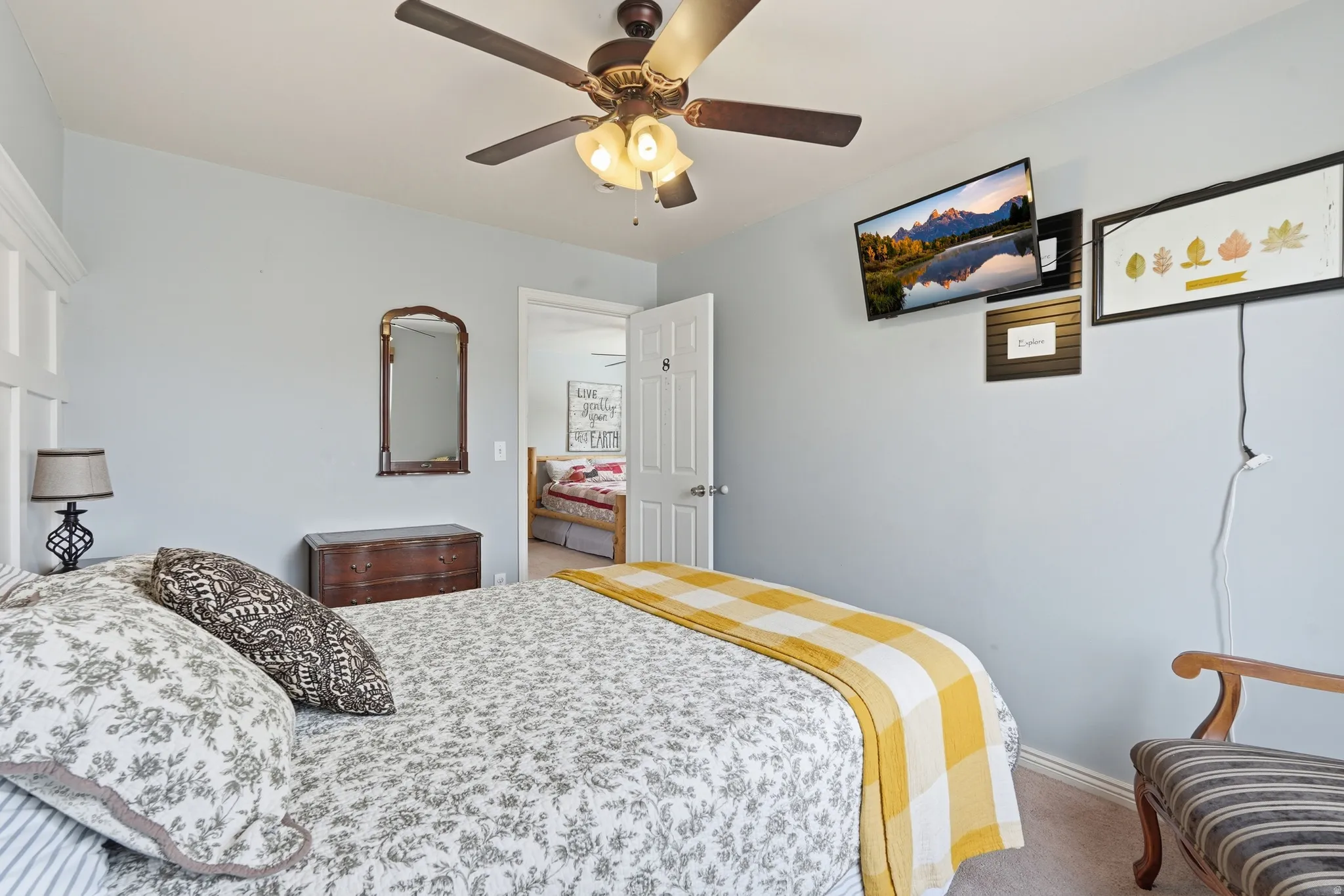 Bedroom with carpet floors and ceiling fan