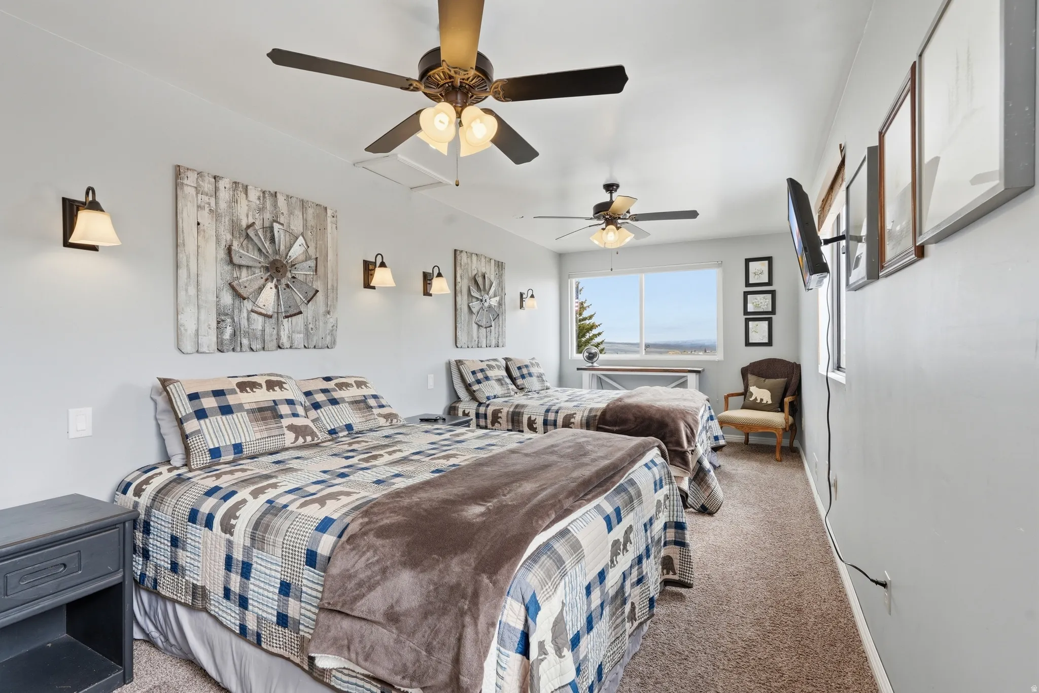 Bedroom featuring carpet and ceiling fan