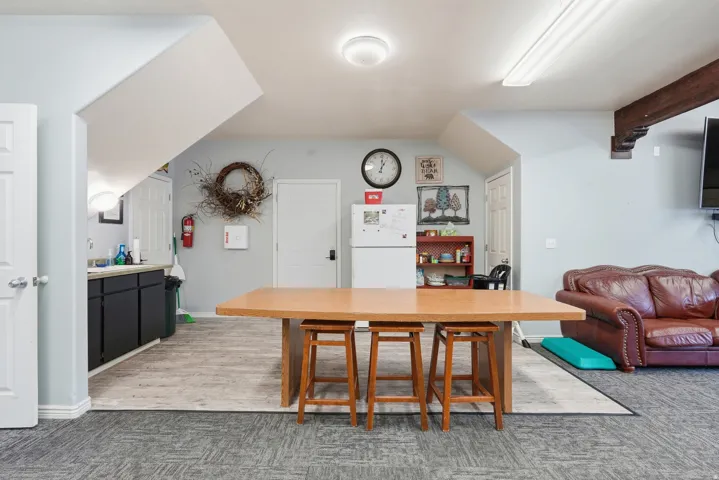 Dining space with light carpet
