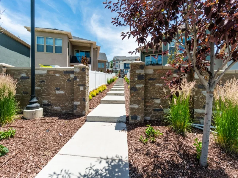 Walkway next to your new home, goes down to park and up between homes to trails