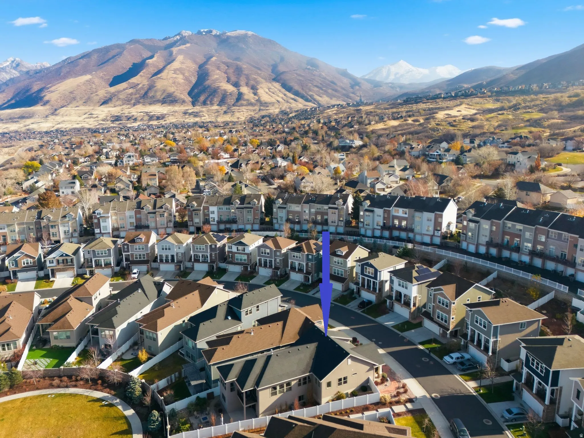 Aerial view of your new residential area with a mountain backdrop