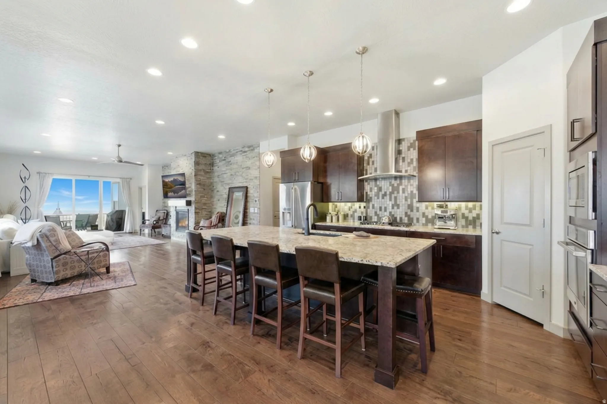 Open great room with hardwood floors, huge island and stunning view!