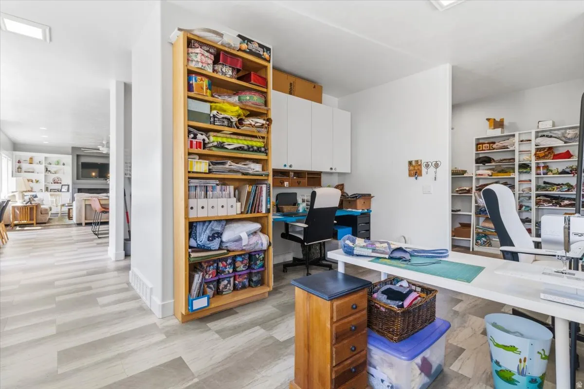 Office featuring a fireplace