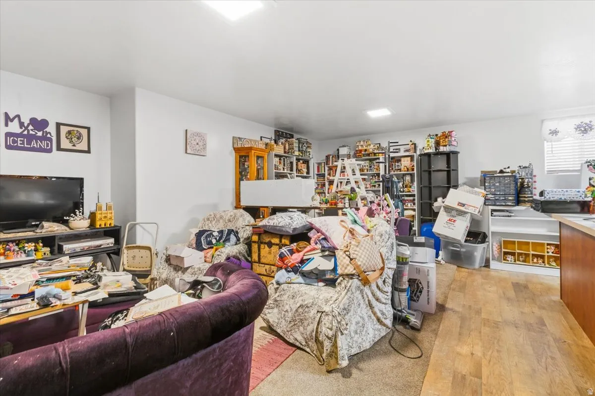 Living area with light wood-style flooring