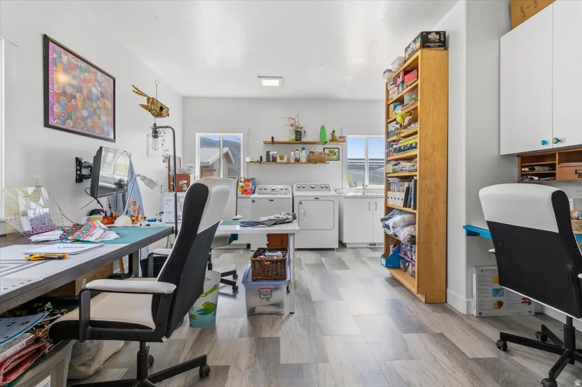 Home office with plenty of natural light and independent washer and dryer