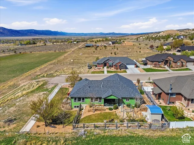 Aerial perspective of suburban area with mountains