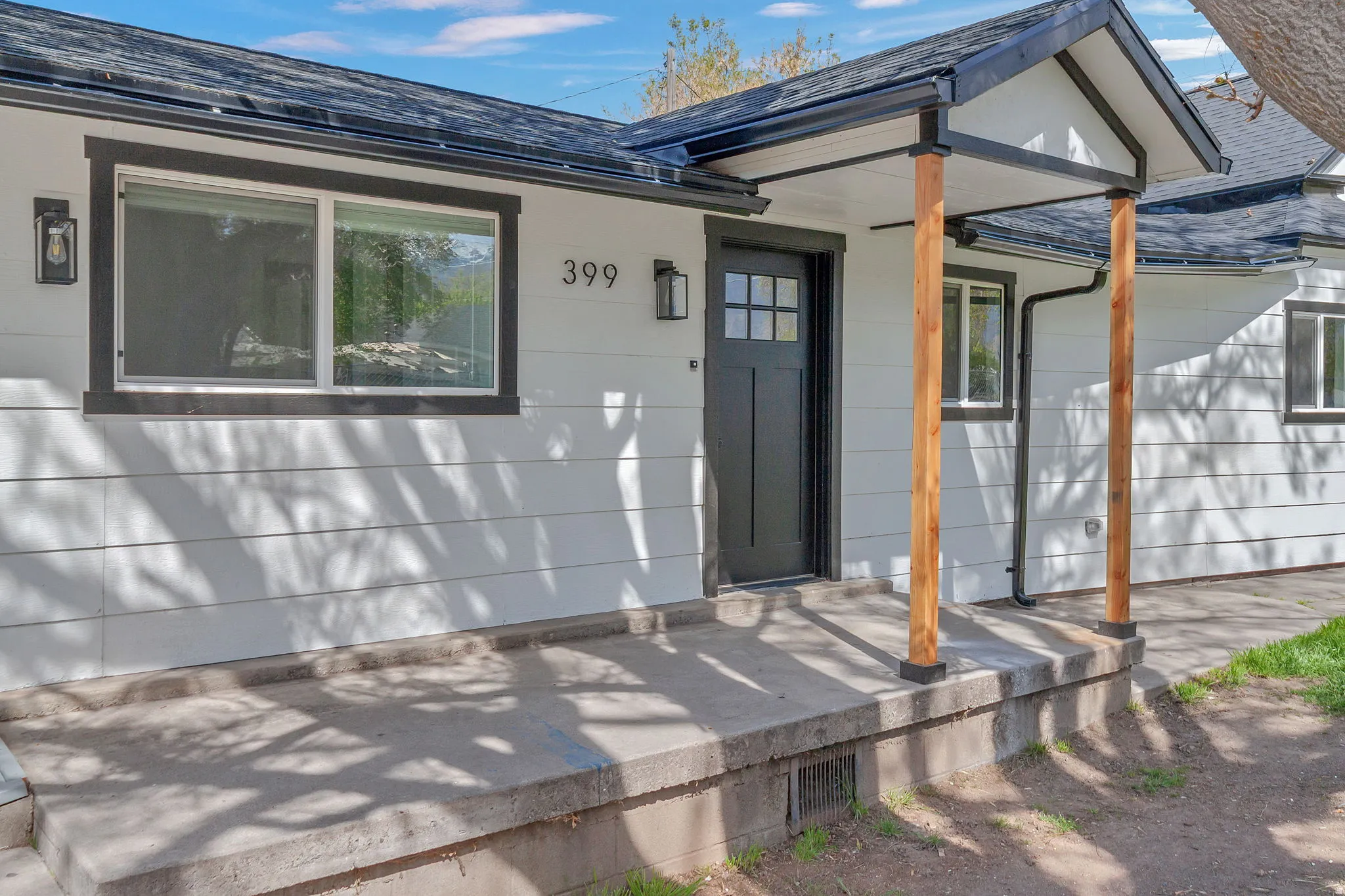 Stately cedar pillars welcome you home.