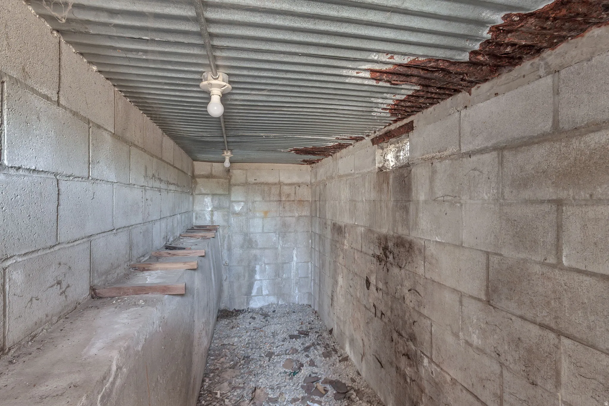Cold storage cellar under the porch cap.