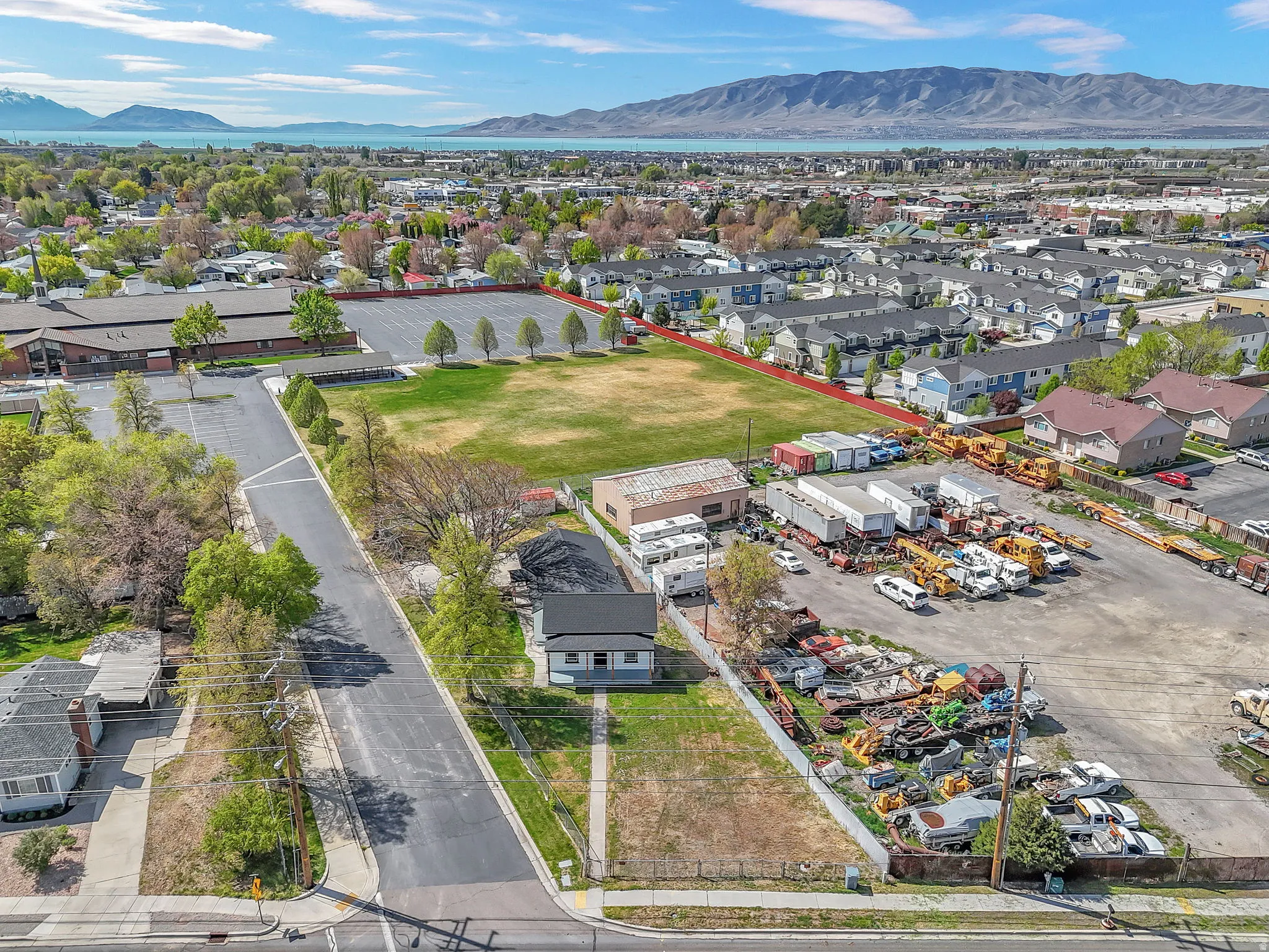 Aerial perspective of suburban area with a mountain backdrop