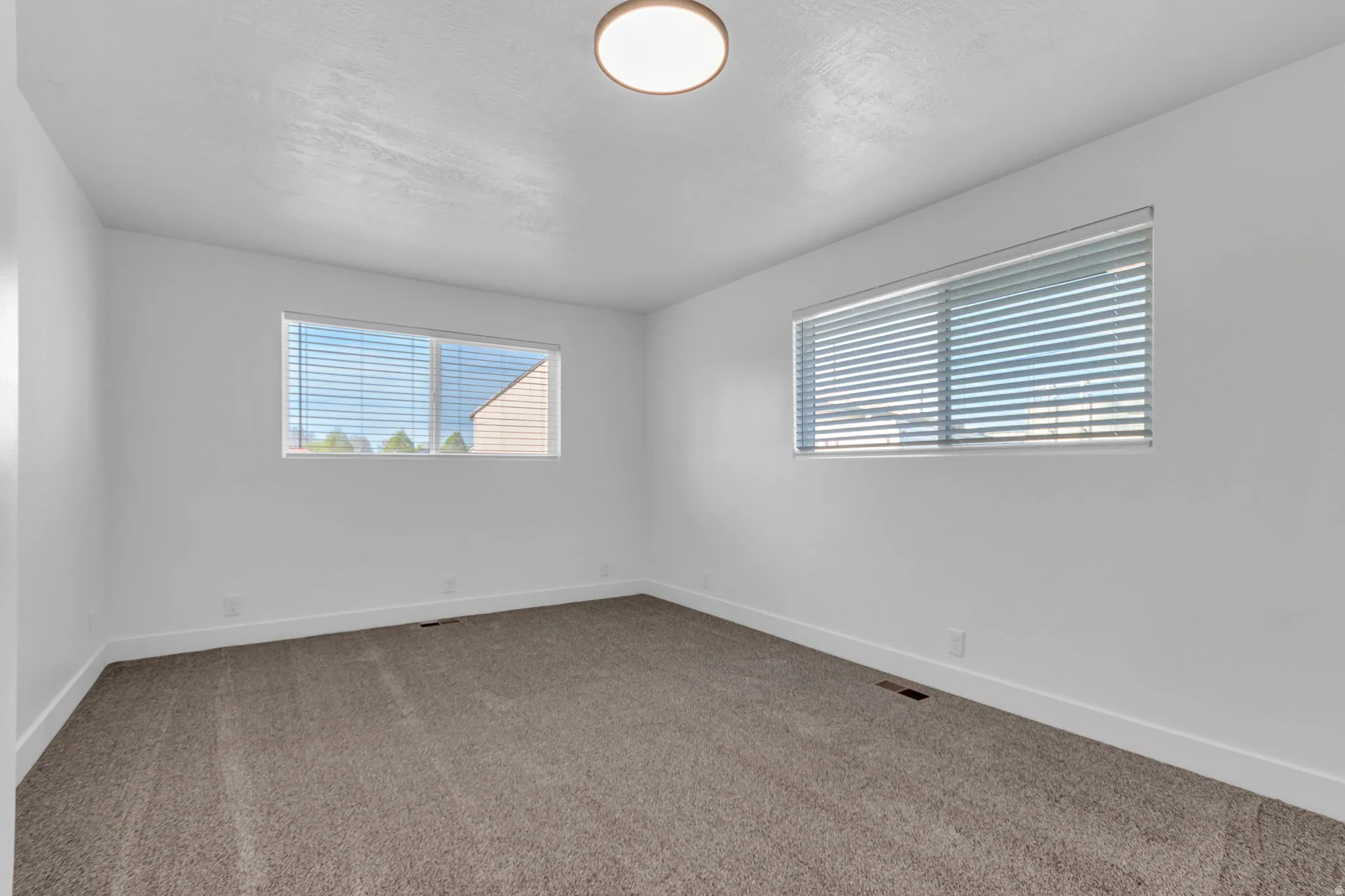 Bedroom 2 with excellent natural light.