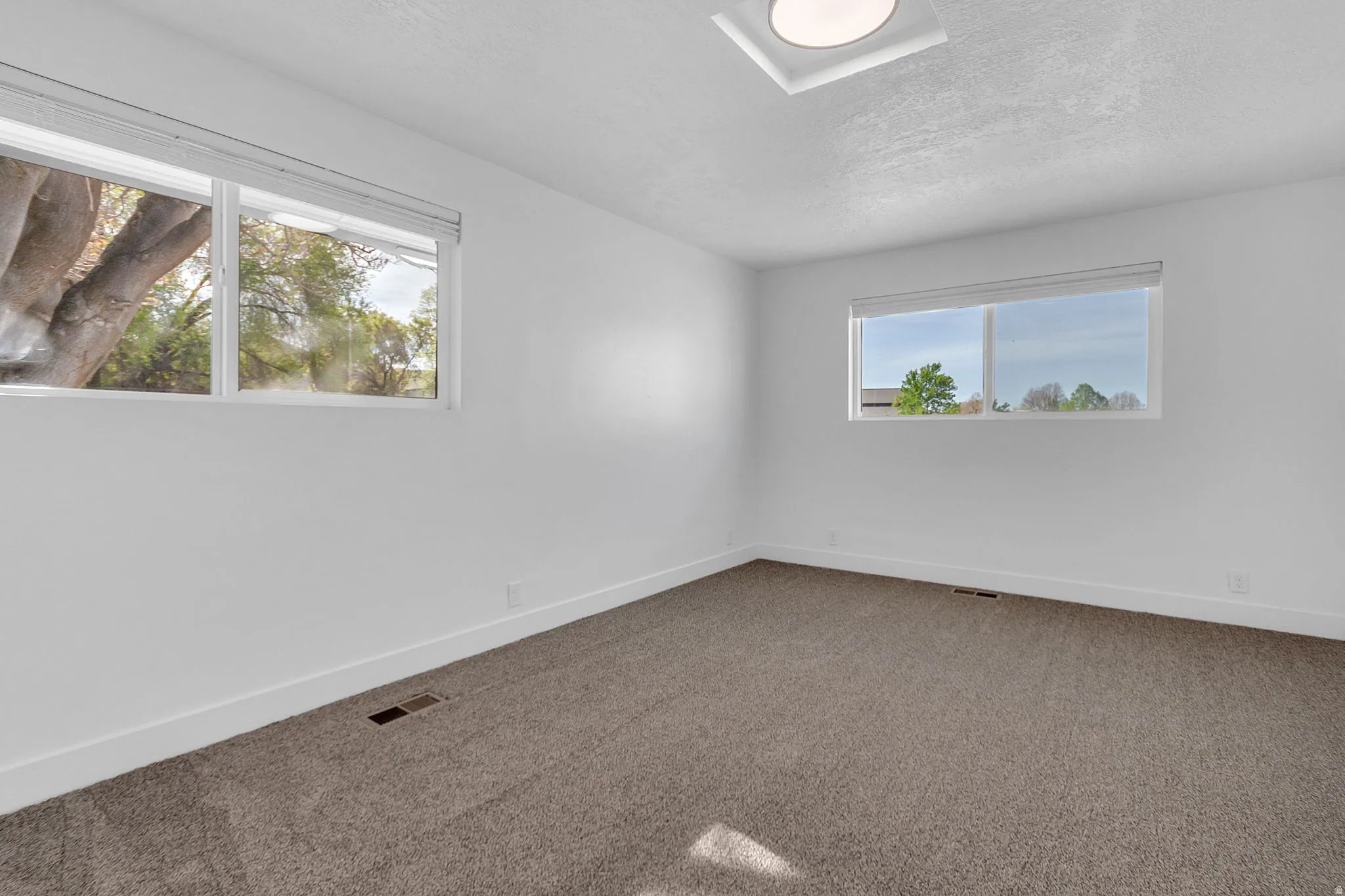 Bedroom 1 with great natural light.