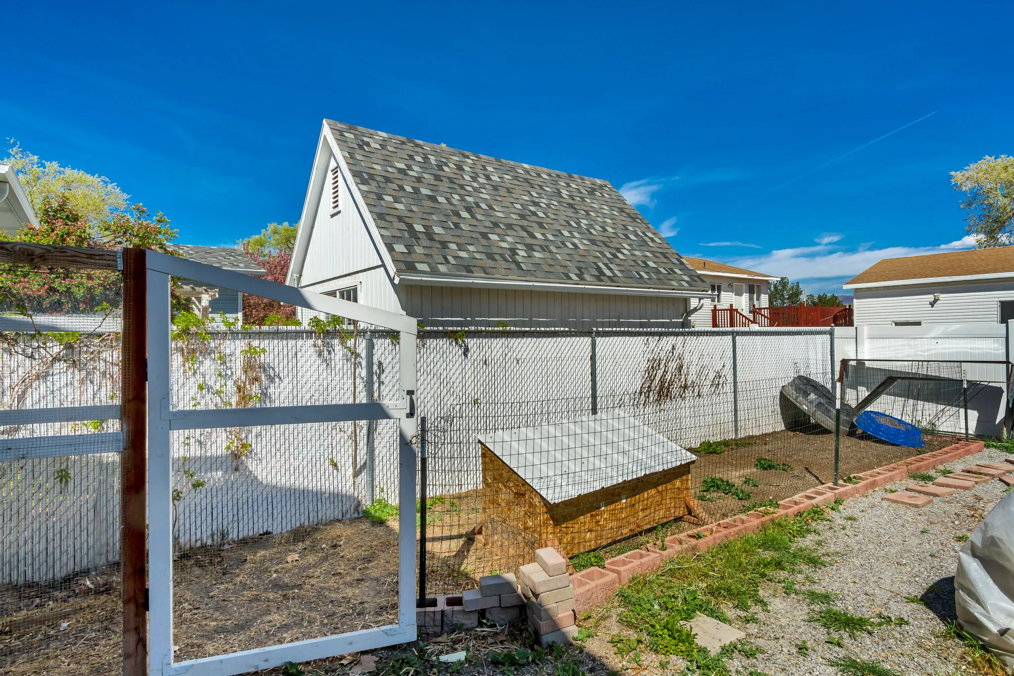 View of fenced backyard