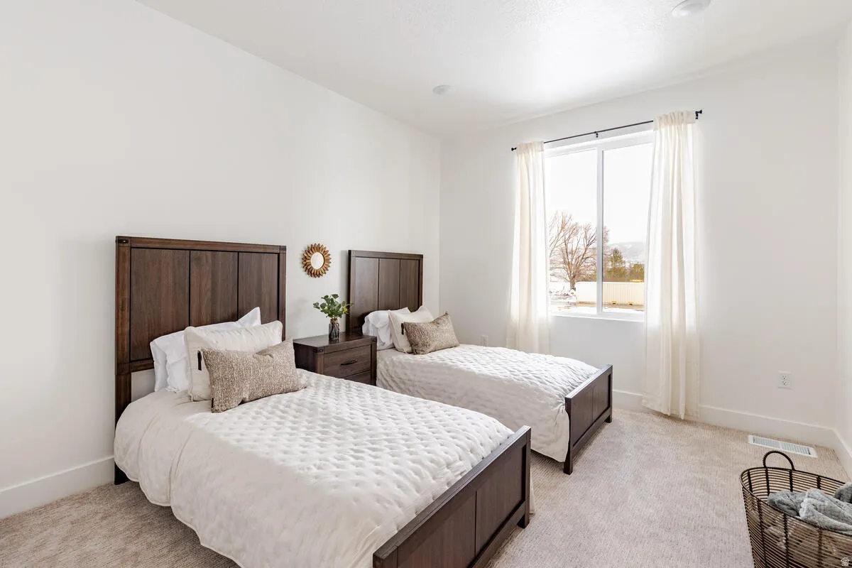 Large bedroom with large closet and window