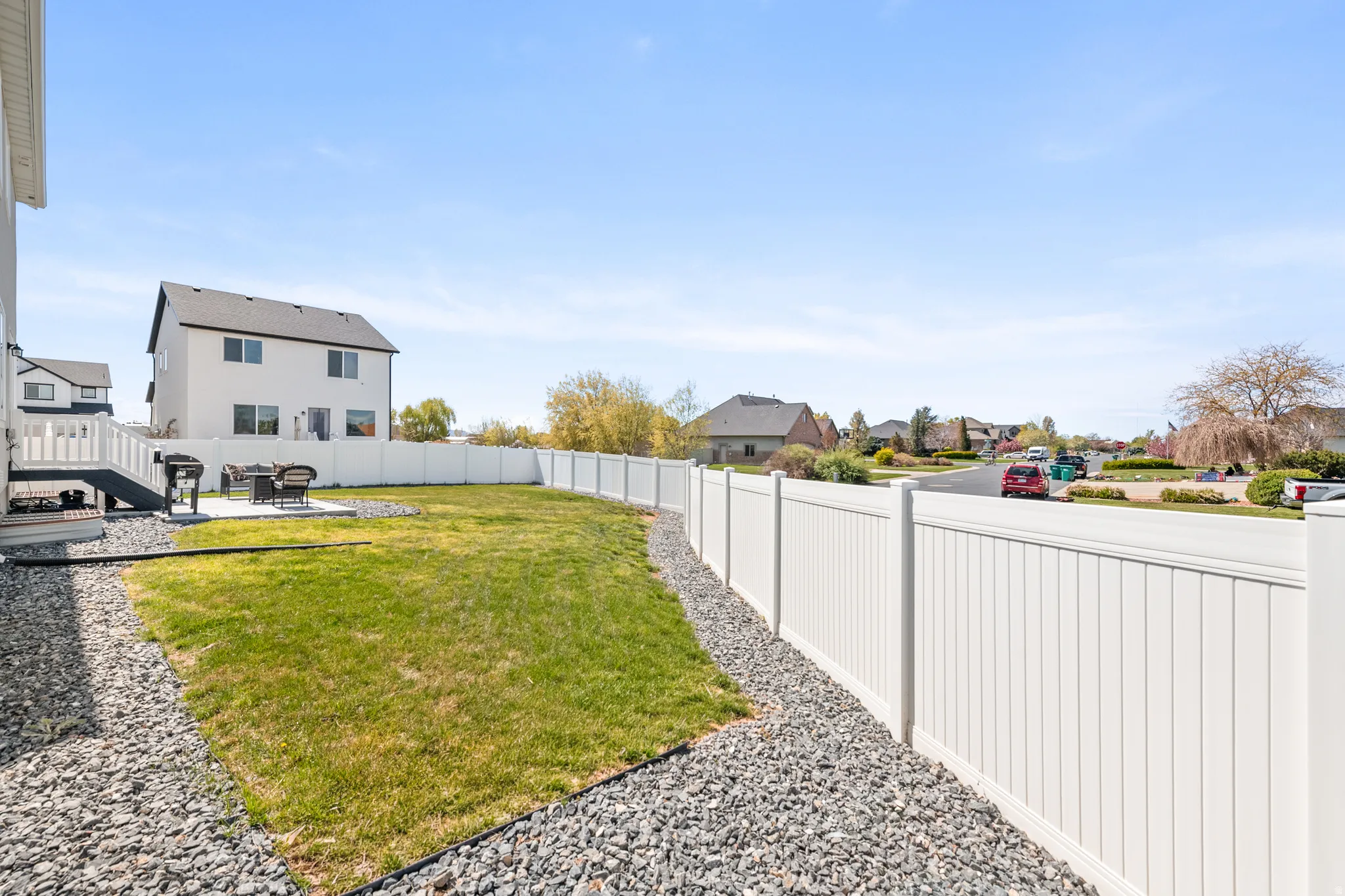 Fenced backyard featuring a patio