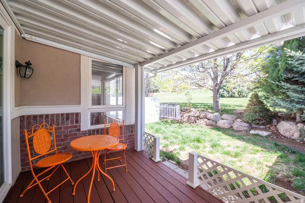 Recently re-painted deck and private, shaded back yard area. Can be enclosed with included fencing panels.